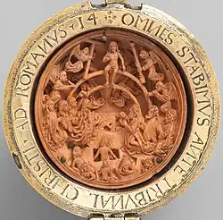 Prayer nut (CA 17.190.328), Flemish, c. 1525–1550. Height: 8.7&nbsp;cm (3.4&nbsp;in).[98] Metropolitan Museum of Art, New York.