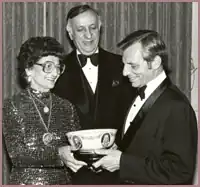 Green presenting a National Italian American Foundation award, c. 1987