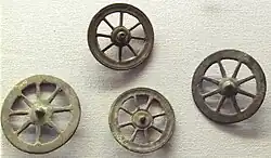 Votive wheels (rouelles) at the Musée d'Archéologie Nationale.