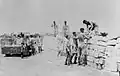 Soldiers construct aircraft revetments at RAF Ta Kali, Malta, using locally quarried limestone blocks, c. 1942
