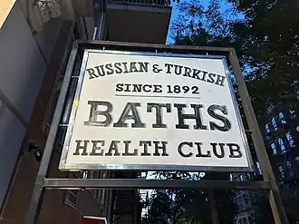 Storefront sign reading "Russian & Turkish Baths"