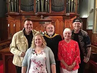 Church minister Des Kitto alongside elders and fundraisers