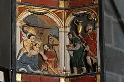 The three wise kings come bearing gifts. Another scene on the shutters of the altarpiece.