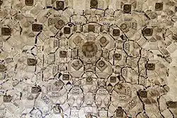 Closer view of the details at the apex of a muqarnas dome in the Sala de los Reyes in the Alhambra