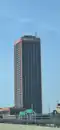 Seneca One Tower pictured in April 2021 after M&T bank sign was added. The Buffalo Bills pennant can also be seen.