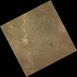 Regional view with Seuss at left and an unnamed crater with a dark central peak complex at right