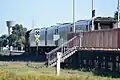 Warrnambool-bound train departs Sherwood Park station, April 2016