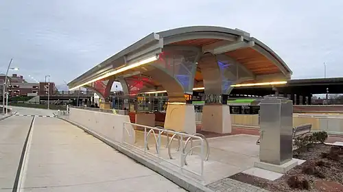 A metal canopy over a bus platform