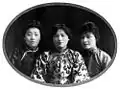 The three Soong sisters in their youth, with Soong Ching-ling in the middle, and Soong Ai-ling (left) and Soong Mei-ling (right)