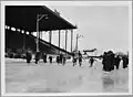 Beginning of the girls' speed-skating race on the sports field at Landowne Park, 1930