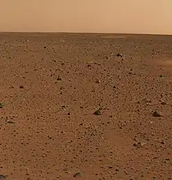 First color picture from Gusev crater. Rocks were found to be basalt. Everything was covered with a fine dust that Spirit determined was magnetic because of the mineral magnetite.