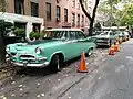 Period vehicles on Monroe Place in Brooklyn Heights during filming