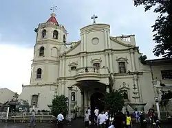 Cathedral facade prior to renovations that began in 2015, removing the concrete pediment and porte cochere added during the American period