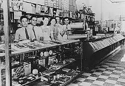 Staff behind the counter at Central cafe, Blackall