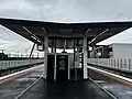 The platform shelters at the new rebuilt elevated station, July 2024