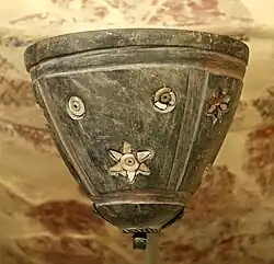 Djemdet Nasr stone bowl, once inlaid with mother-of-pearl, red paste, and bitumen.