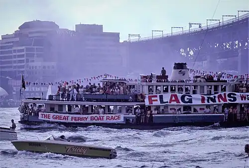 Competing in the inaugural Great Ferry Boat Race in her Public Transport Commission colours, 1980