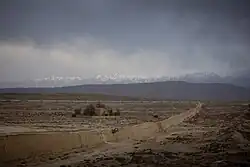 The Great Wall near Jiayu Pass, Qilian Mountains in behind