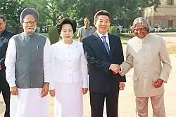 Kwon in India with Roh Moo-hyun, Manmohan Singh, and A.P.J Abdul Kalam in 2004