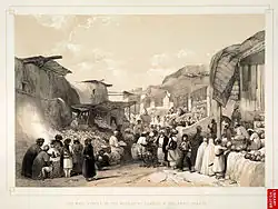 The main street in the bazaar at Caubul; men wearing khet partug (1842)