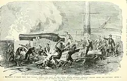An explosion among men on deck of a warship