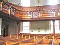 The tiered gallery with decorative woodwork c1880 at Plough Lane Chapel, Lion Street, Brecon.