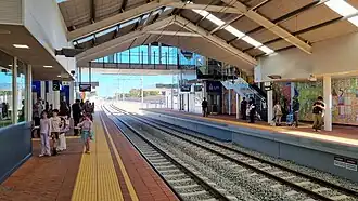 A railway station with two side platforms