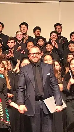 Tim Rhys-Evans conducting at the AMIS Honor Choir 2019 in Beijing