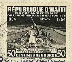 A woman in a dress and a man in a uniform posing in front of troops.