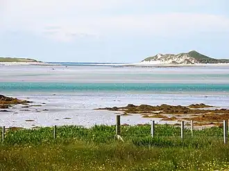 Towards Kirkibost Island Looking out across the sea towards the sand dunes at the southern end of Kirkibost Island