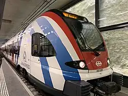 An RABe 522 train in Léman Express livery at Genève-Eaux-Vives railway station on opening day, 15 December 2019