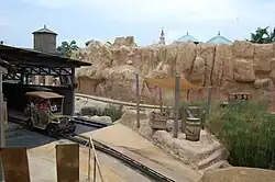 A car exiting the station