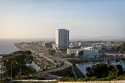 The western side of Treasure Island as seen from Yerba Buena Island. Faintly visible in the distance are the Richmond–San Rafael Bridge and Brickyard Cove.