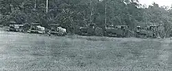 Three Decauville steam locomotives and three Campagne rail tractors on a forest railway at the Société Legros in Aguémoné near Ayem, ca 1935