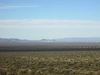 View across the Tucson Basin towards Tumamoc Hill (left) and "A" Mountain (right), which can be seen in the center of the background.