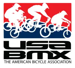 USA BMX logo, with four cyclists on a red-and-blue background