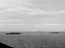 USS Gregory (APD-3) and USS Little (APD-4) underway during practice landings in the Fiji Islands on 30 July 1942