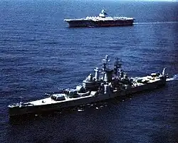 USS Newport News alongside USS Enterprise (CVAN-65) In 1962.