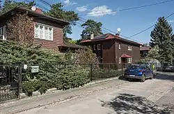 Historic wooden houses at Bawełniana Street in 2024.
