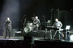 A new wave band playing at an entertainment district in London, the capital city of England and the United Kingdom in 2012.