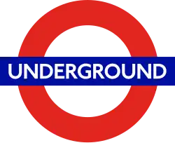 The word "UNDERGROUND" in white letters superimposed on a blue rectangle superimposed on the red circumference of a circle on a clear background