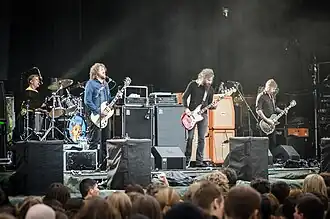 Mastodon performing in 2012. L–R: Brann Dailor, Brent Hinds, Troy Sanders, Bill Kelliher