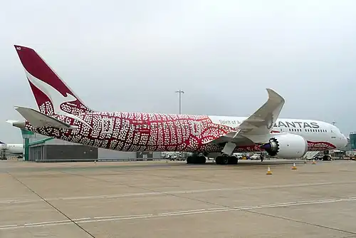 A Boeing 787–9 in 2018 wearing the Yam Dreaming livery, based on internationally renowned artist Emily Kame Kngwarreye's 1991 painting 'Yam Dreaming'. The aircraft has carried the colour scheme since 2018.