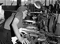 Veronica Foster inspects a lathe at the John Inglis & Co. Bren gun plant, May 1941