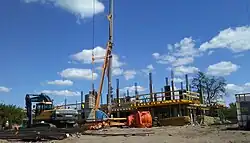 Volvo excavator on construction site in Tomaszów Mazowiecki, Poland