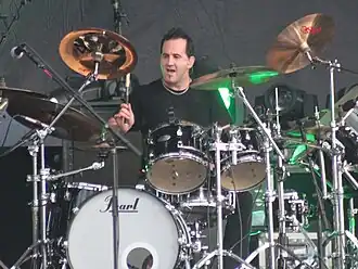 Macaluso subbing with Symphony X in 2013