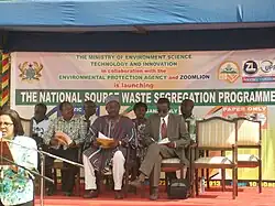 People sitting on a stage