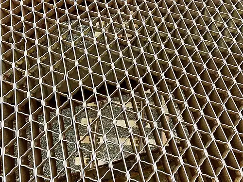 The bridge's steel grate road deck.