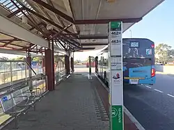 Bus stops with large shelter