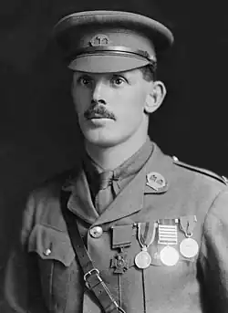 Head and shoulders portrait of a man in military cap and uniform
